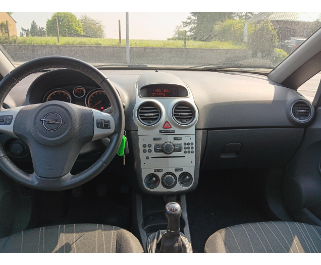 Opel Corsa D Enjoy 5drs metro bj. 01/2010 99629 km Garage Van Wassenhove