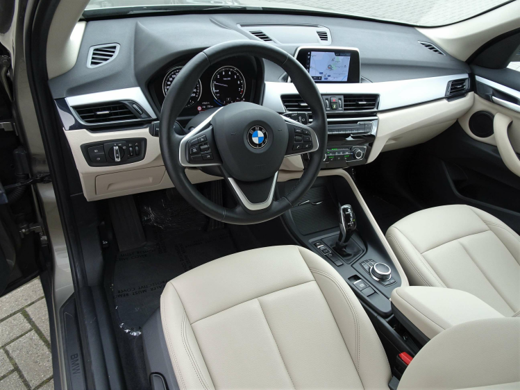 BMW X1 1.5iA sDrive18 NAVI,LEDER,CRUISE,BLUETH,PDC V+A Garage Nico Vanderheeren BV