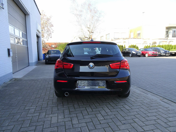 BMW 118 118i 5d. NAVI,CRUISE,PDC,BLUETH,AIRCO,ALU,USB Garage Nico Vanderheeren BV