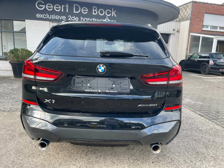 BMW X1 2.0iAxDriveMSPORT/PANO/H UP/TREKH Geert De Bock