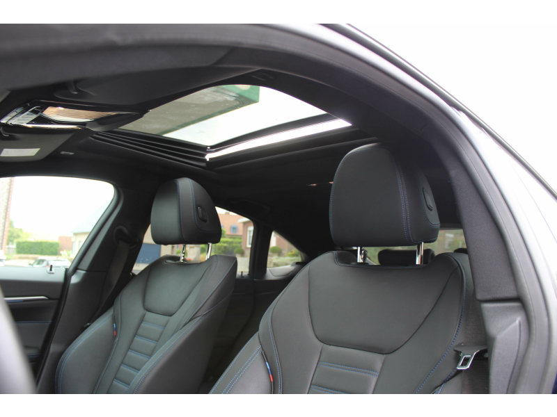 BMW i4 eDrive40 M Sport / PANO / HUD / H/K / LEER - FULL! Garage Van Den Dooren