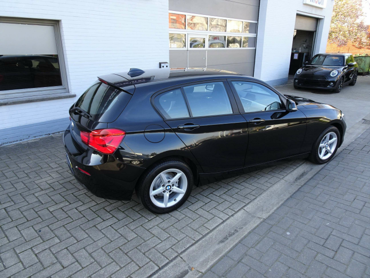 BMW 118 118i 5d. NAVI,CRUISE,PDC,BLUETH,AIRCO,ALU,USB Garage Nico Vanderheeren BV