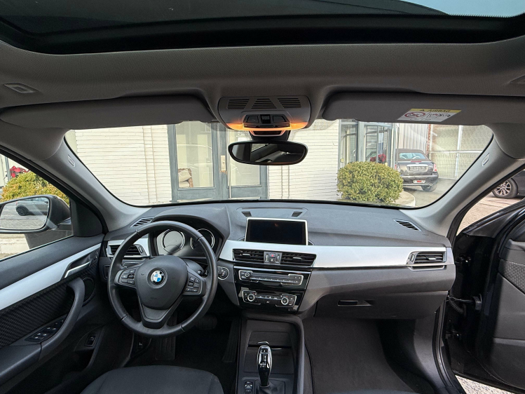 BMW X1 1.5iA sDrive18/NAVI/PANO DAK/PDC/ALU Geert De Bock